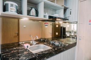 Simply and Comfortable Studio Apartment B Residence By Travelio