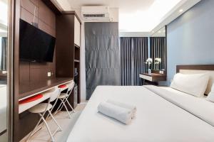 Fancy and Nice Studio at Transpark Bintaro Apartment By Travelio