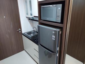 Fancy and Nice Studio at Transpark Bintaro Apartment By Travelio