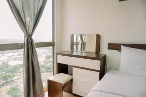Comfort and Modern Look 2BR Apartment M-Town Signature By Travelio