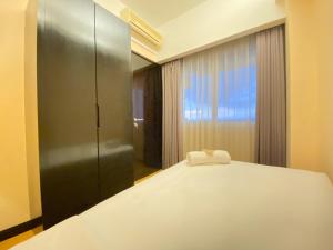 Comfort Living 2BR at Braga City Walk Apartment By Travelio