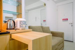 Minimalist and Cozy Living 2BR at Bassura City Apartment By Travelio