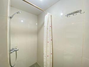 Cozy Designed Studio Apartment at Grand Asia Afrika By Travelio