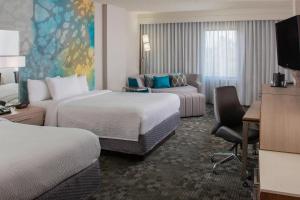 Queen Room with Two Queen Beds room in Courtyard by Marriott Orlando Lake Buena Vista in the Marriott Village