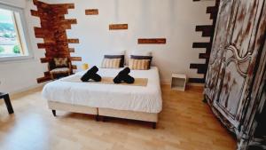 Maisons de vacances Maison famille et spa : photos des chambres