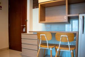 Nice and Homey 2BR Apartment at Capitol Park Residence By Travelio