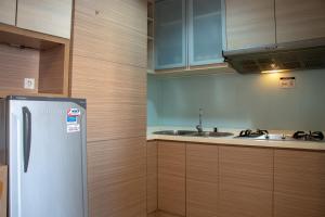 Nice and Homey 2BR Apartment at Capitol Park Residence By Travelio