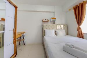 Comfortble 2BR at Bassura City Apartment By Travelio