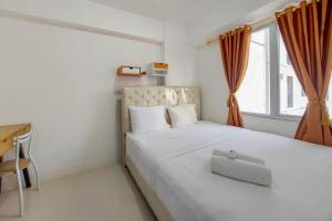 Comfortble 2BR at Bassura City Apartment By Travelio