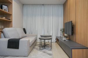 Nice and Homey 1BR at Branz BSD City Apartment By Travelio