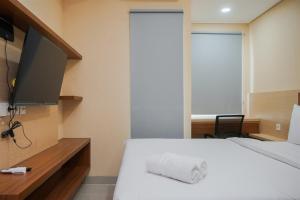 Nice and Fancy Studio Apartment at B Residence By Travelio