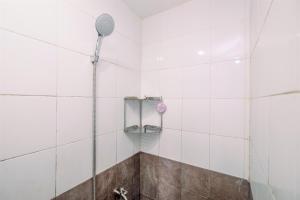 Fancy and Nice Studio at Green Pramuka City Apartment By Travelio