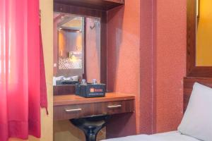 Fancy and Nice Studio at Green Pramuka City Apartment By Travelio