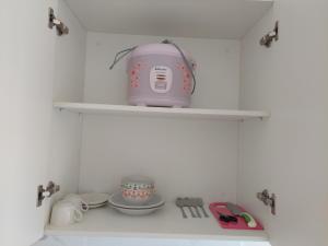 Elegant and Homey Studio at Sky House BSD Apartment By Travelio