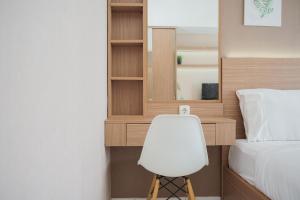 Comfort and Cozy Studio at Casa De Parco Apartment By Travelio