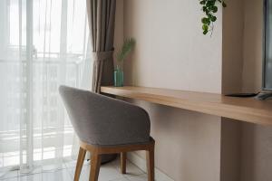 Comfort and Cozy Studio at Casa De Parco Apartment By Travelio