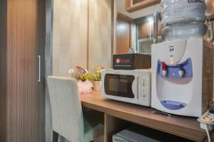 Comfort and Cozy Studio at MT Haryono Square Apartment By Travelio