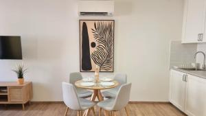 Appartements SUNNY Neuf - Climatise - Centre ville : photos des chambres