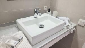 Appartements SUNNY Neuf - Climatise - Centre ville : photos des chambres