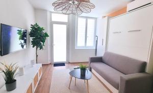 Appartements FLORAL Neuf- Climatise - Centre ville : photos des chambres