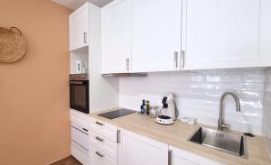 Appartements FLORAL Neuf- Climatise - Centre ville : photos des chambres