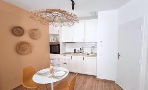 Appartements FLORAL Neuf- Climatise - Centre ville : photos des chambres