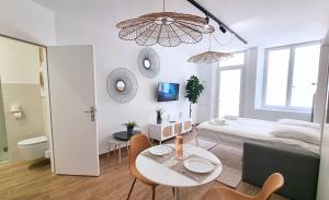 Appartements FLORAL Neuf- Climatise - Centre ville : photos des chambres