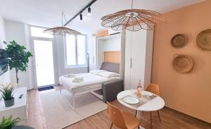 Appartements FLORAL Neuf- Climatise - Centre ville : photos des chambres