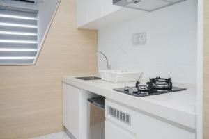 Comfortable and Simply Studio at Sky House BSD Apartment By Travelio