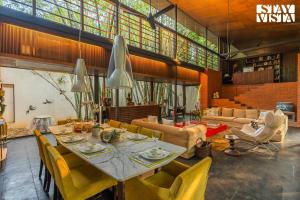 StayVista at Shashwat Villa with Private Pool, Lawn & Gym