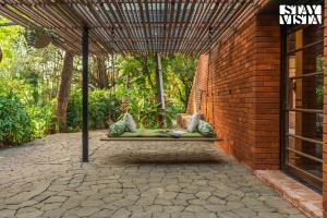 StayVista at Shashwat Villa with Private Pool, Lawn & Gym