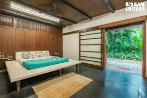 StayVista at Shashwat Villa with Private Pool, Lawn & Gym