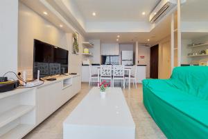 Nice and Spacious 2BR with Extra Room at Branz BSD City Apartment By Travelio