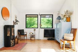 The Red Summer House With The Lush Garden At Asnæs