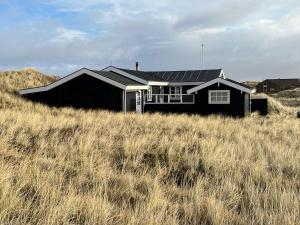 Bright House In Dune Row Near The North Sea