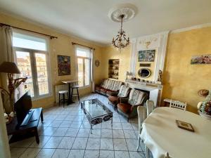 Appartements appartquaisete et garage : photos des chambres