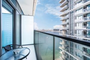 Stunning Beachfront Home with Panoramic Sea Views