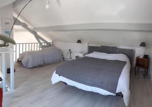 Appartements Opale les pins : photos des chambres