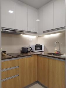 Savvy Suite 1BR near Okada