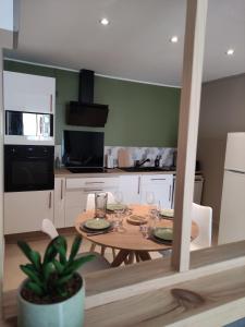 Appartements Le Kaki vegetal : photos des chambres
