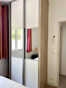 Appartements Le Kiwi, bel appartement moderne en pleine nature : photos des chambres