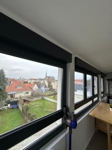 Appartements # Le 13 # Nouveau T3 renove au calme vue sur les Vosges : photos des chambres