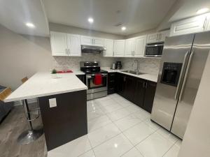 CozyHaven A private entrance, comfy basement apartment in Mississauga with free parking Conveniently located with easy access to the airport downtown Toronto major malls and highways for a seamless stay