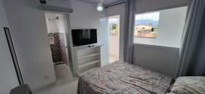 Loft Cs.2 a 30m da Praia. Wi-Fi, TV, Ar Cond.