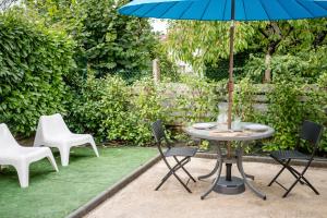 Appartements La p-tite Auxerroise, mini-maison avec jardin ! : photos des chambres