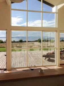Summerhouse With A View Of The Water