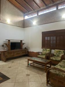 Casa à 3 minutos a pé da Praia, com churrasqueira!