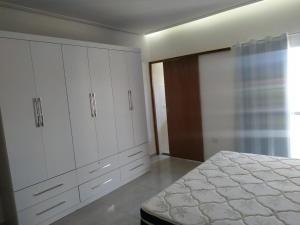 Casa perto da praia com piscina e churrasqueira