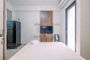 Nice and Cozy Studio at Transpark Cibubur Apartment By Travelio