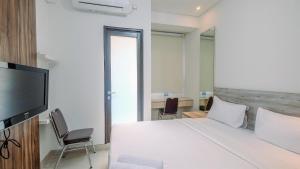 Nice and Cozy Studio at Transpark Cibubur Apartment By Travelio